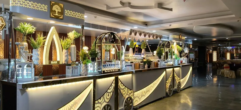 Ornately decorated buffet counter with white and gold facade styling